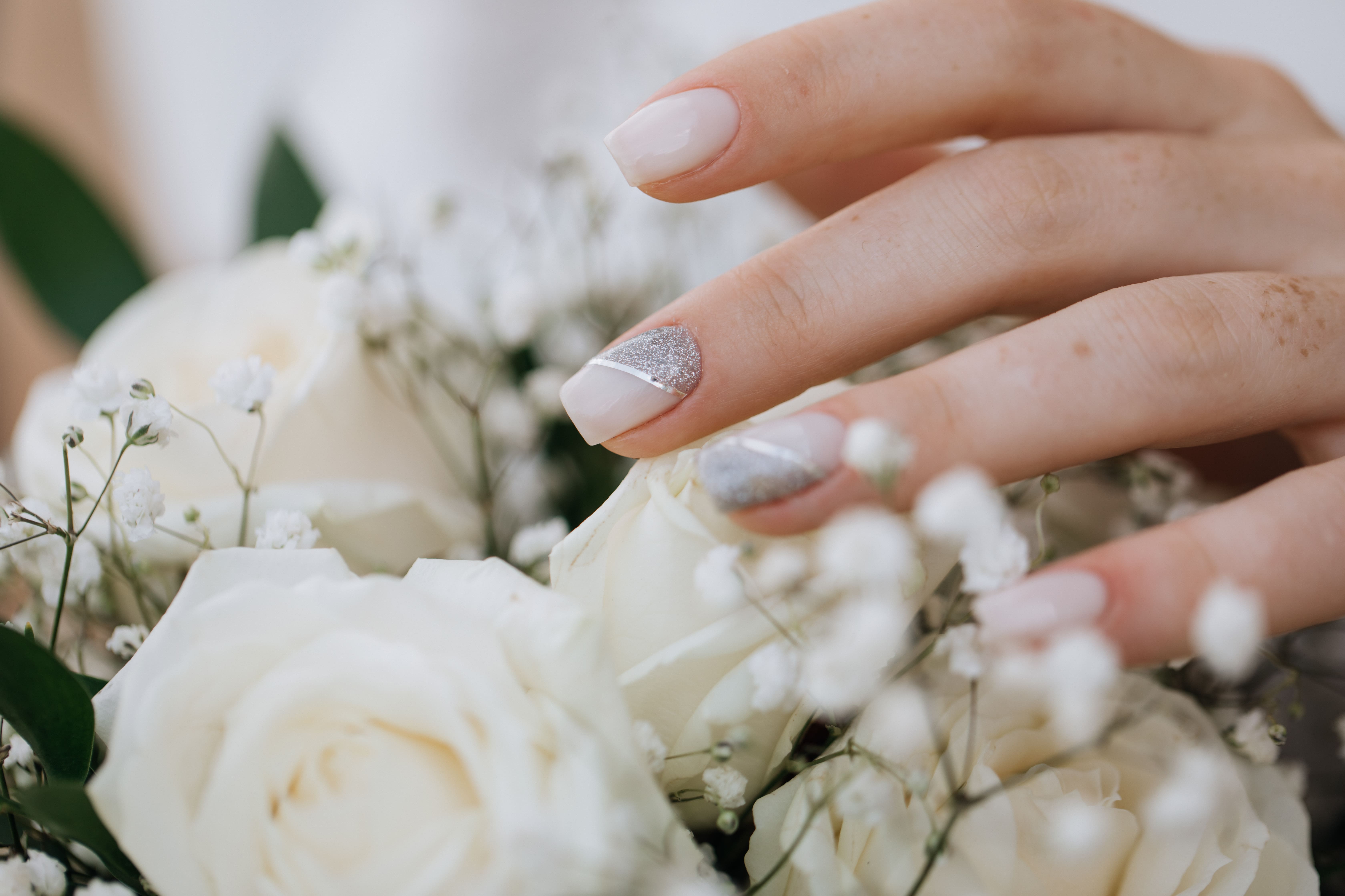 Bride Demonstrates Her Manicure Wedding Bouquet